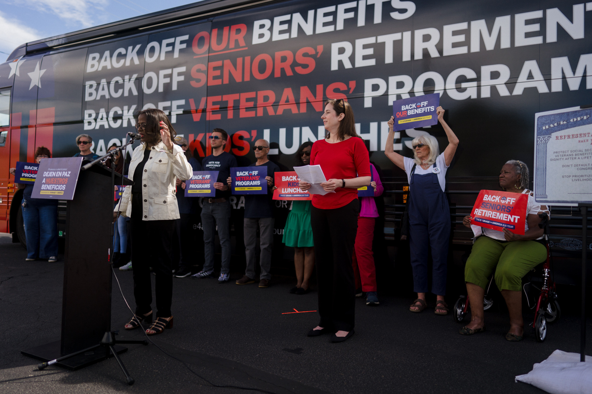 Courage for America leaders speak in front of the Back Off Our Benefits Bus in Phoenix, AZ.