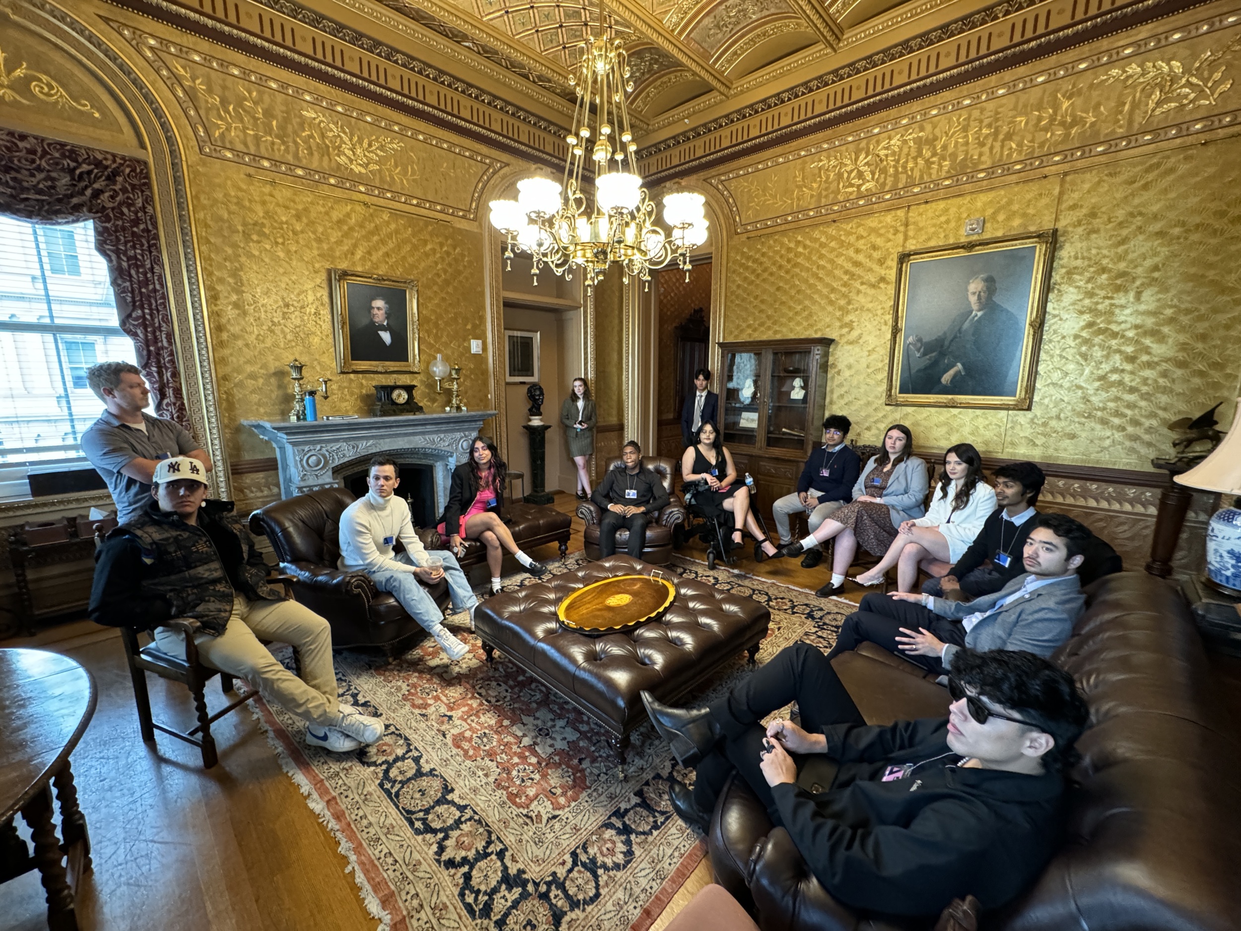 Creators sit in the Eisenhower Executive Office Building meeting with White House staff.